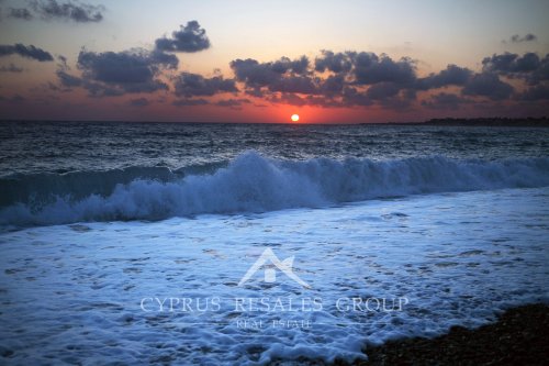 Sunset over the coast of Coral Bay, Paphos region, Cyprus